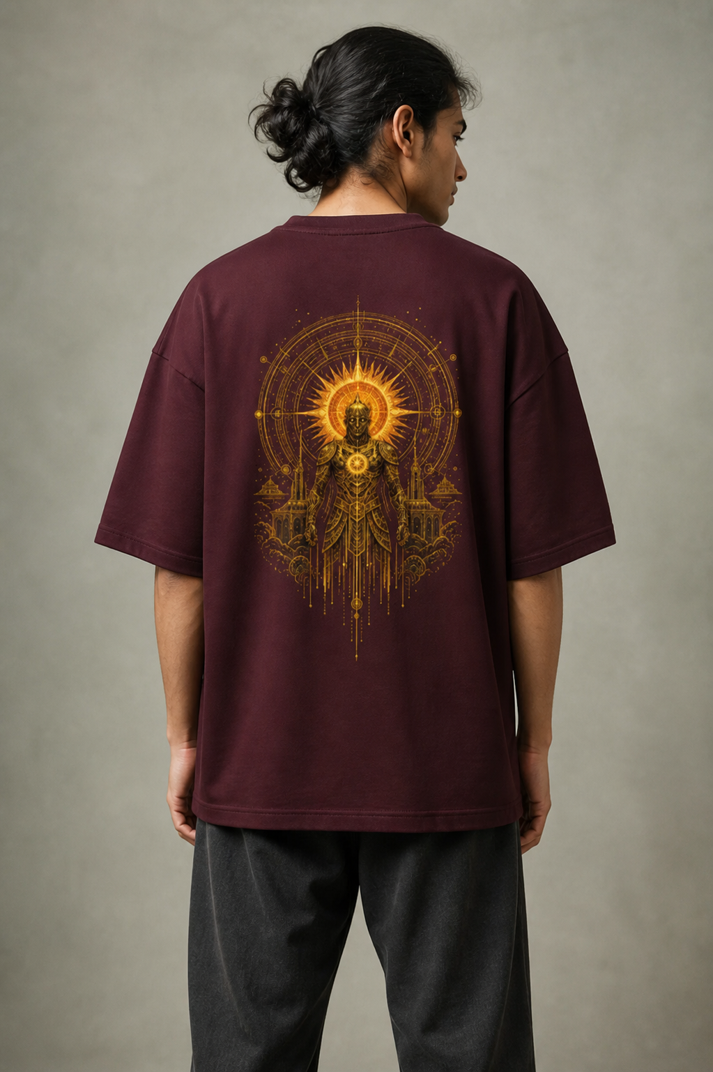 Suryaputra oversized tee in maroon – golden sun-deity back print worn by model