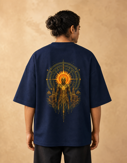 Suryaputra oversized tee in navy blue – golden sun-deity back print worn by model
