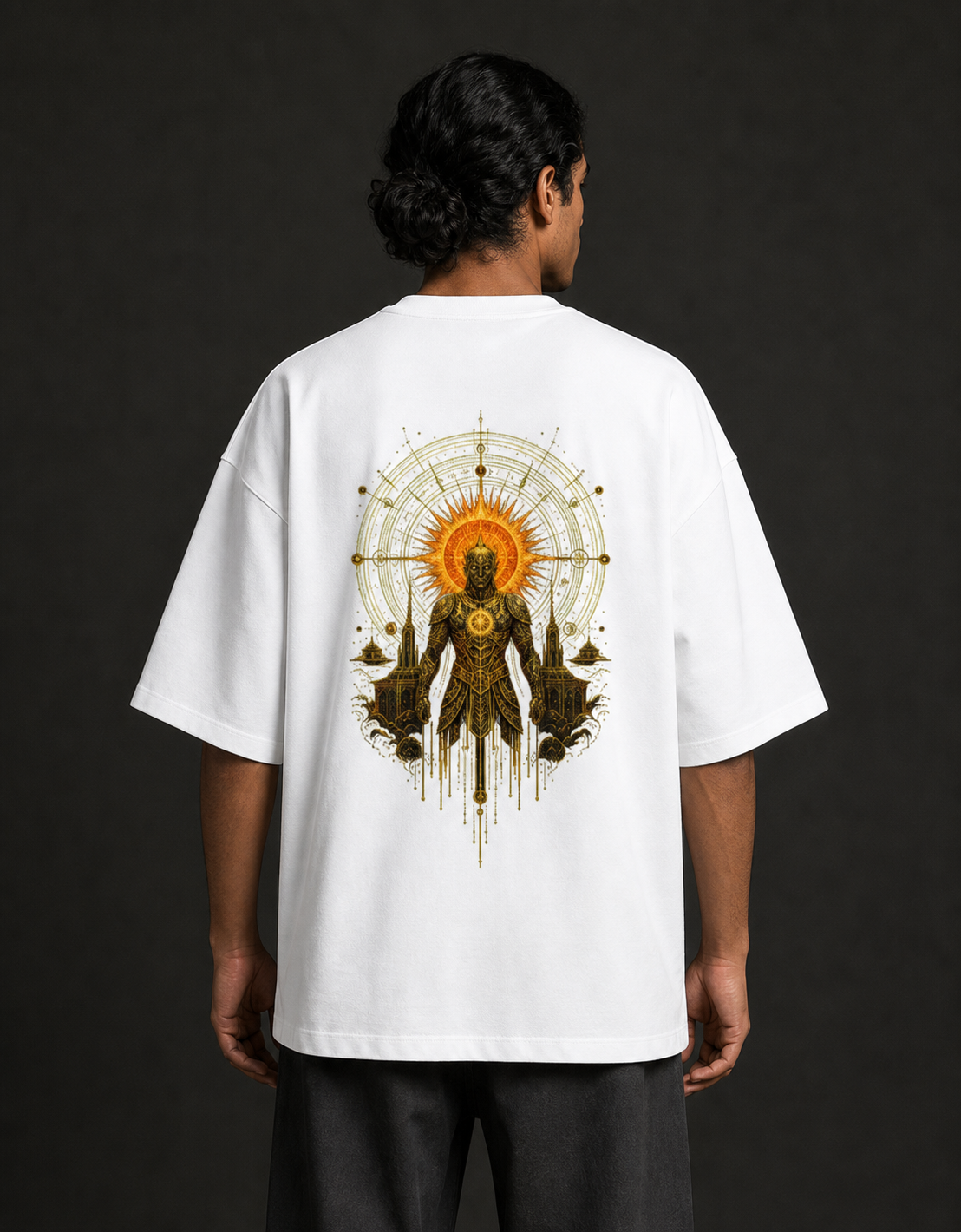 Suryaputra oversized tee in white – golden sun-deity back print worn by model